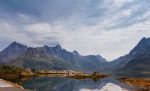 Norway Island In Fjord. Cloudy Nordic Day. Hotel On Island Stock Photo