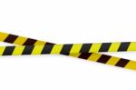 Yellow And Black Warning Tape Stock Photo