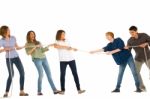 Teenagers Playing Tug Of War Stock Photo