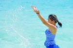 Happy Girl In The Sea Stock Photo