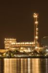 Oil Refinery Plant Night Scene Nearby River Stock Photo