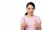 Smiling Woman With Thumbs Up Gesture Stock Photo