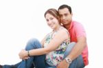 Smiling Couple Sitting Stock Photo