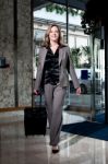 Businesswoman Entering To Hotel Stock Photo