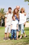 Grandparents With Children, Outdoors Stock Photo