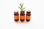 Rosemary Essential Oil On White Stock Photo