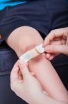 Child Knee With A Plaster (for Wounds) And Bruise Stock Photo