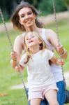 Mother And Daughter Having Fun Outdoors Stock Photo