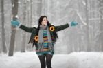 Beautiful Young Woman In A Sweater On A Winter Walk In A Park Stock Photo