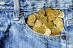 Coin Stack And Blue Jeans Lack Stock Photo