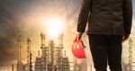 Engineering Man With Safety Helmet Standing In Industry Estate A Stock Photo