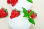 Organic Greek Yogurt And Strawberry Stock Photo