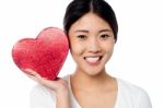 Woman Displaying Her Valentine Gift Stock Photo