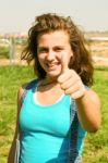 Sweet Girl With Thumbs Up Stock Photo