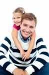 Father And Daughter Having Fun Together Stock Photo