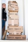 Woman Being Shocked By Amazon.com Delivery Stock Photo