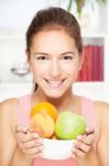 Woman With Bowl Of Fruits Stock Photo