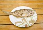 Fried Fish On  Wood Background Stock Photo