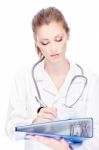 Doctor With Papers And Stethoscope Stock Photo