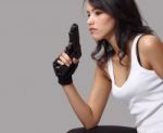 Woman And Gun Stock Photo