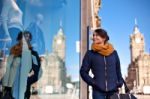 Girl Is Looking At Shop Window Stock Photo