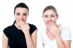 Surprised Young Girls Laughing Out Loud Stock Photo