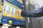 People Fix Node Fiber Optic In Network Room Stock Photo