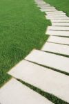 Serpentine Pathway Stones On A Park Lawn (concept) Stock Photo