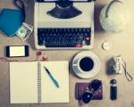 Typewriter And Personal Items On The Table Stock Photo