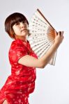 Chinese Model In Traditional Cheongsam Dress Stock Photo