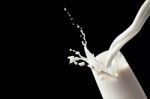 White Milk In Glass Stock Photo