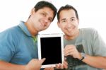 Young Men Showing Tablet Pc Stock Photo