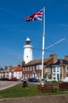 Union Jack Flag Flying Near The Lighthouse In Southwold Stock Photo