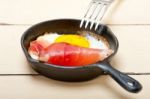 Egg Sunny Side Up With Italian Speck Ham Stock Photo