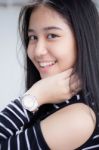 Portrait Of Thai Student Teen Beautiful Girl Relax And Smile Stock Photo