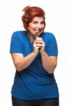 Curvy Woman Eating Chocolate Stock Photo