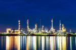 Oil Refinery At Night In Bangkok, Thailand Stock Photo