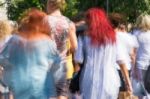 Blurry People Walking In The Street Stock Photo