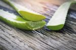 Aloe Vera Leaves On Wooden Stock Photo