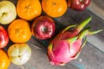 Colorful Of Fruits On Wooden Stock Photo