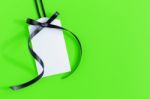 Gift Tag On Green Background Stock Photo