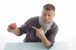 Young Male Pointing The Apple Stock Photo