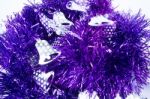 Purple Holiday Decoration Ribbon On White Background Stock Photo