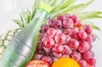 Bottles Of Fruit Juice And Fruits Stock Photo