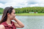 Woman Tourist At Huai Krathing Reservoir Stock Photo