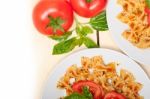 Italian Pasta Farfalle Butterfly Bow-tie And Tomato Sauce Stock Photo