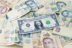 US Dollar And Singapore Bank Notes Stock Photo