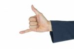 Businessman Show Thumb And Little Finger Or Horn Sign Stock Photo