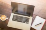 Hot Coffee Latte Cup On Working Table Stock Photo