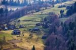 Sunny Spring In Mountain Village. Fields And Hills Stock Photo